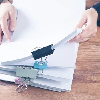 stack of paper clipped documents