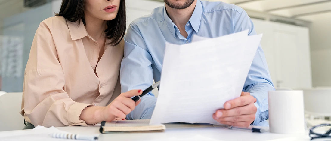 Two employees discussing the dissolution of an LLC in Missouri