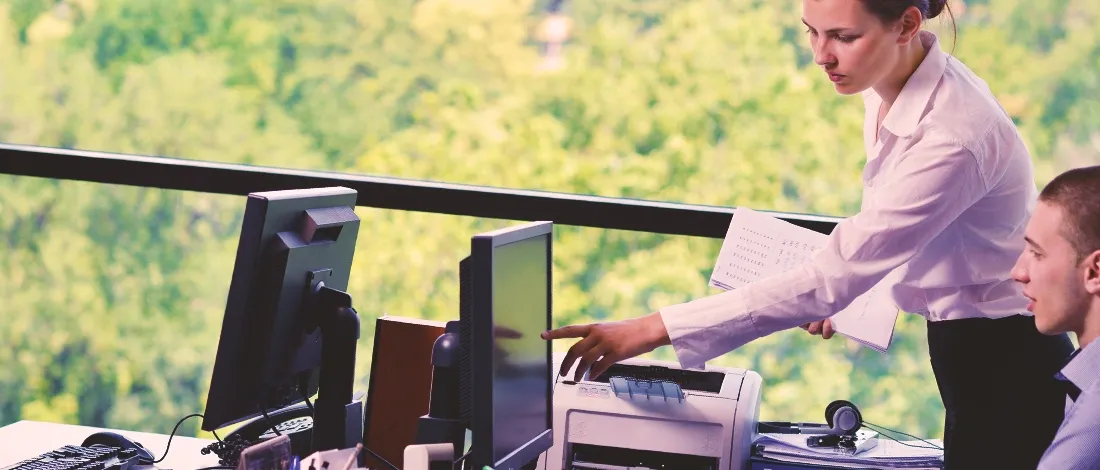 Two employees looking up an LLC in Georgia