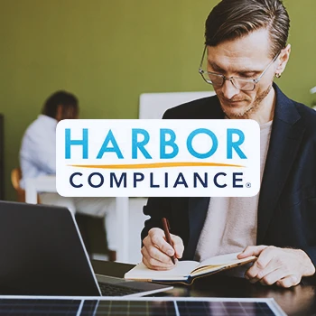 Harbor compliance logo with an office worker in the background