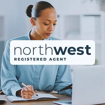 Northwest Registered Agent Service logo with an office worker in the background