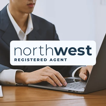 Northwest logo with an office person in the background