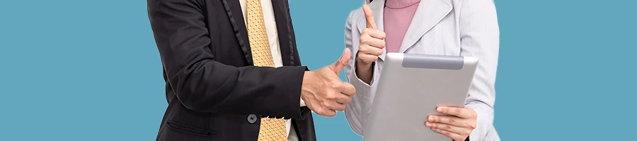 An image of two people showing a thumbs up after they bought an LLC service in Nevada