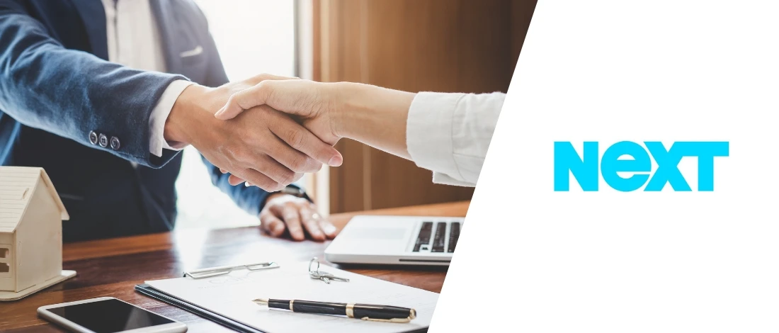 Business people closing a deal with Next Insurance