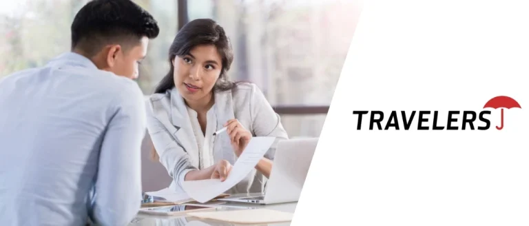 Business people discussing Travelers Insurance