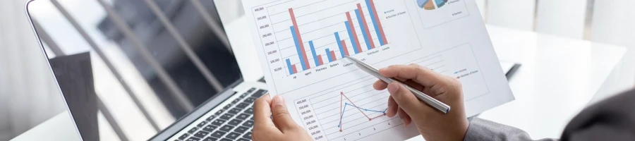 A person studying trend charts