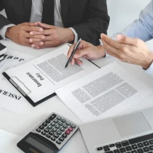 Two people discussing insurance