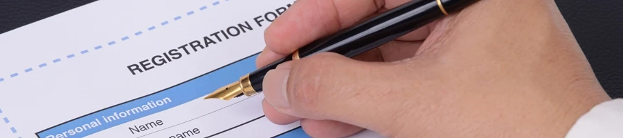 A person filling up the registration form