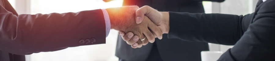 Closing a business deal with a shake of hands