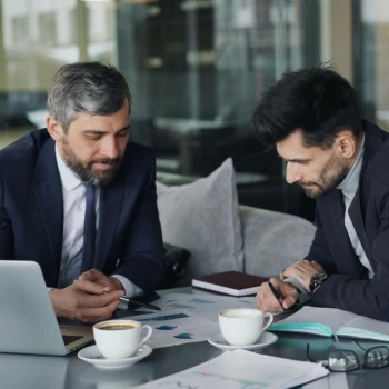 Business people discussing LLC