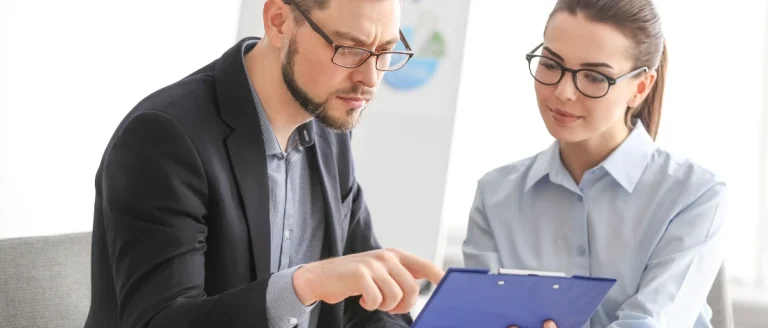 Two people discussing how to open an LLC in USA for Non Resident
