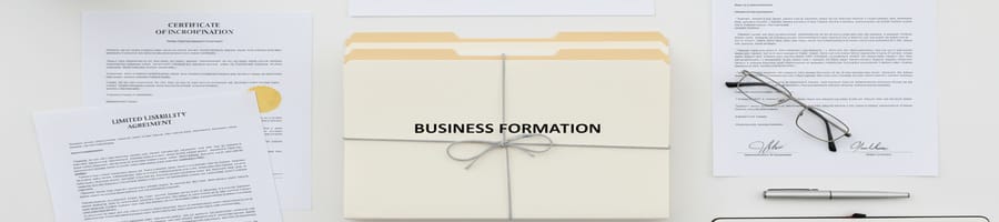 a couple of official documents and files on the table