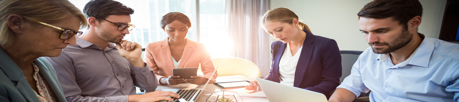 a group of people discussing business operation
