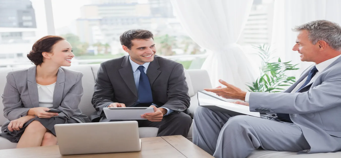 Business people having a meeting in cosy meeting room