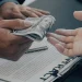 Handing money for an LLC operating agreement in Delaware
