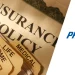 Folders and insurance policies from Progressive Insurance