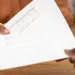 A woman filing a paper for forming an LLC without SSN