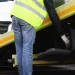 a man picking up a car after he started a towing company LLC