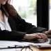 A business woman searching for the LLC cost in Illinois