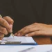 An LLC owner calculating costs
