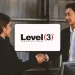 Two employees explaining level 3 of LLC communication